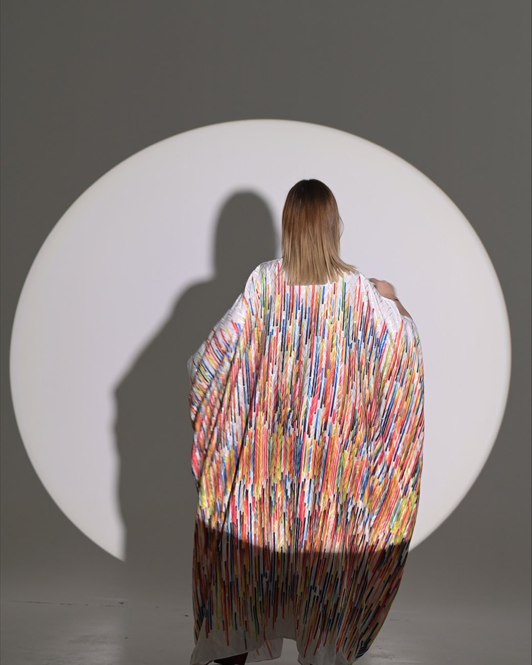 Colorful silky texture abaya with loose stripes and open sleeves