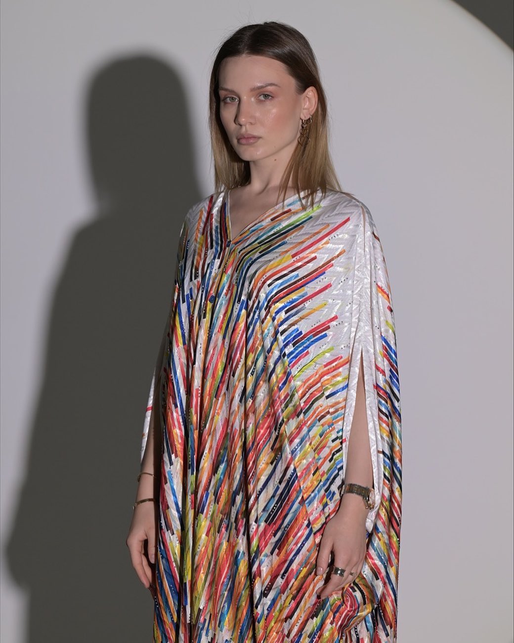 Colorful silky texture abaya with loose stripes and open sleeves