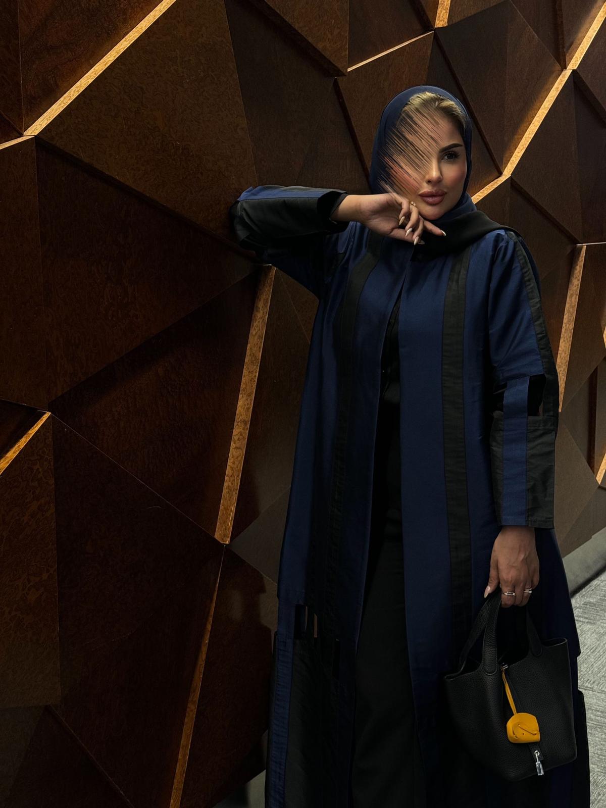 Navy blue abaya with elegant black pieces