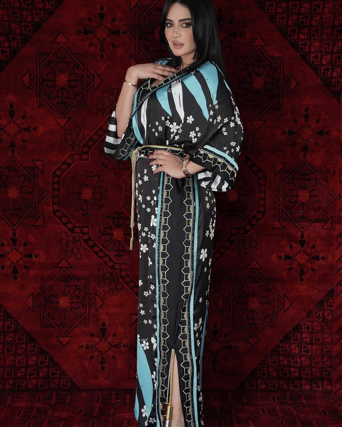 Black and blue abaya with rope accessories and wide sleeves