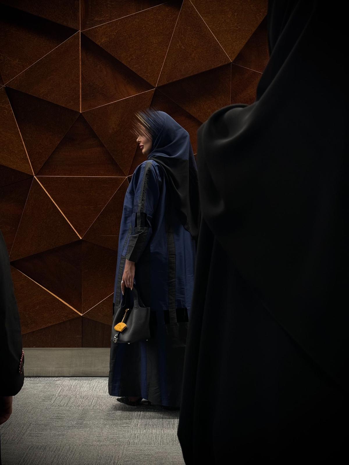 Navy blue abaya with elegant black pieces