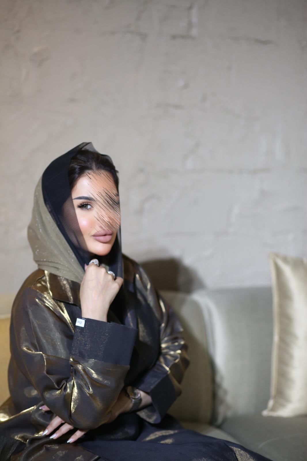 Abaya with golden shine