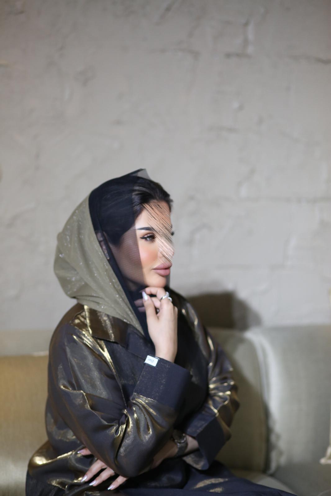 Abaya with golden shine