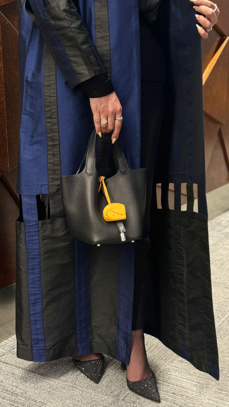 Navy blue abaya with elegant black pieces