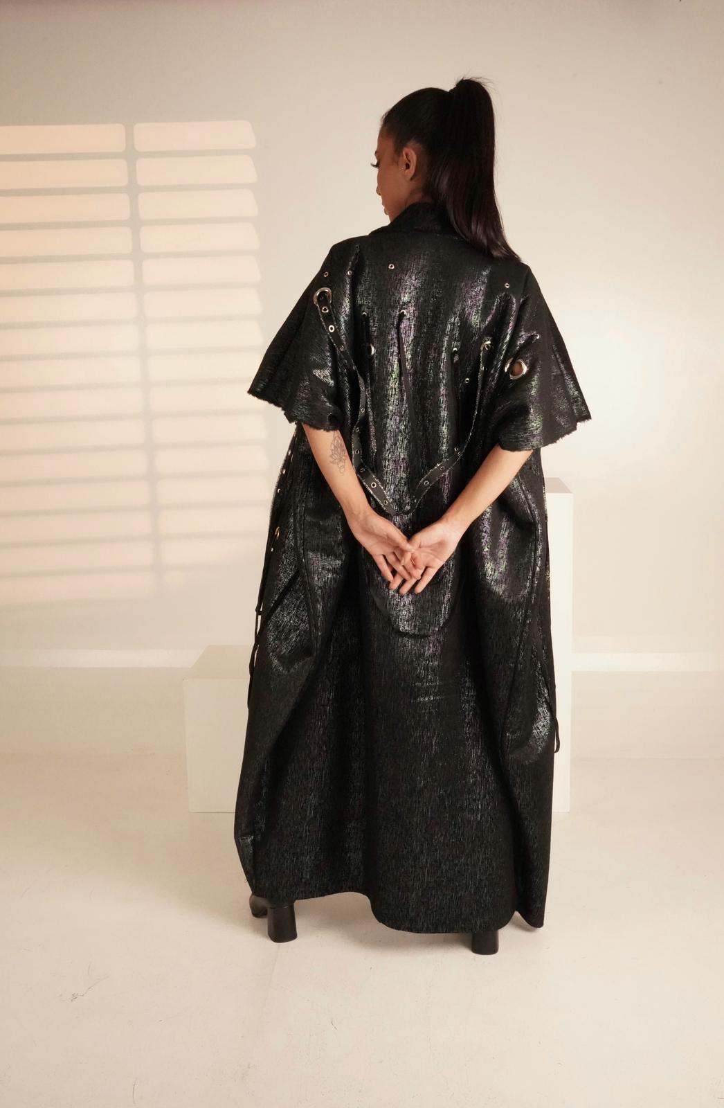 Abaya with metal rings and shiny fabric