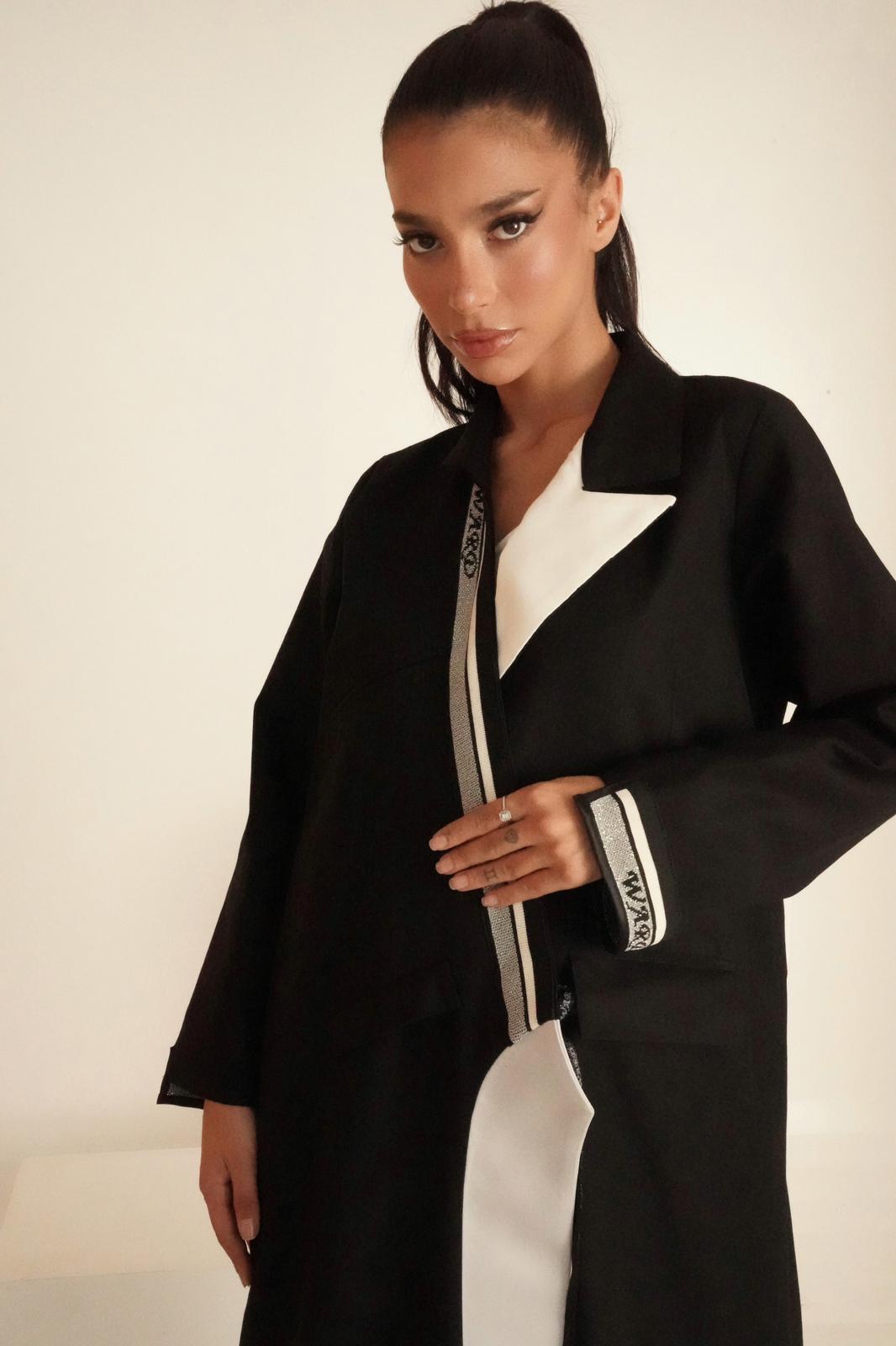 Elegant black and white abaya