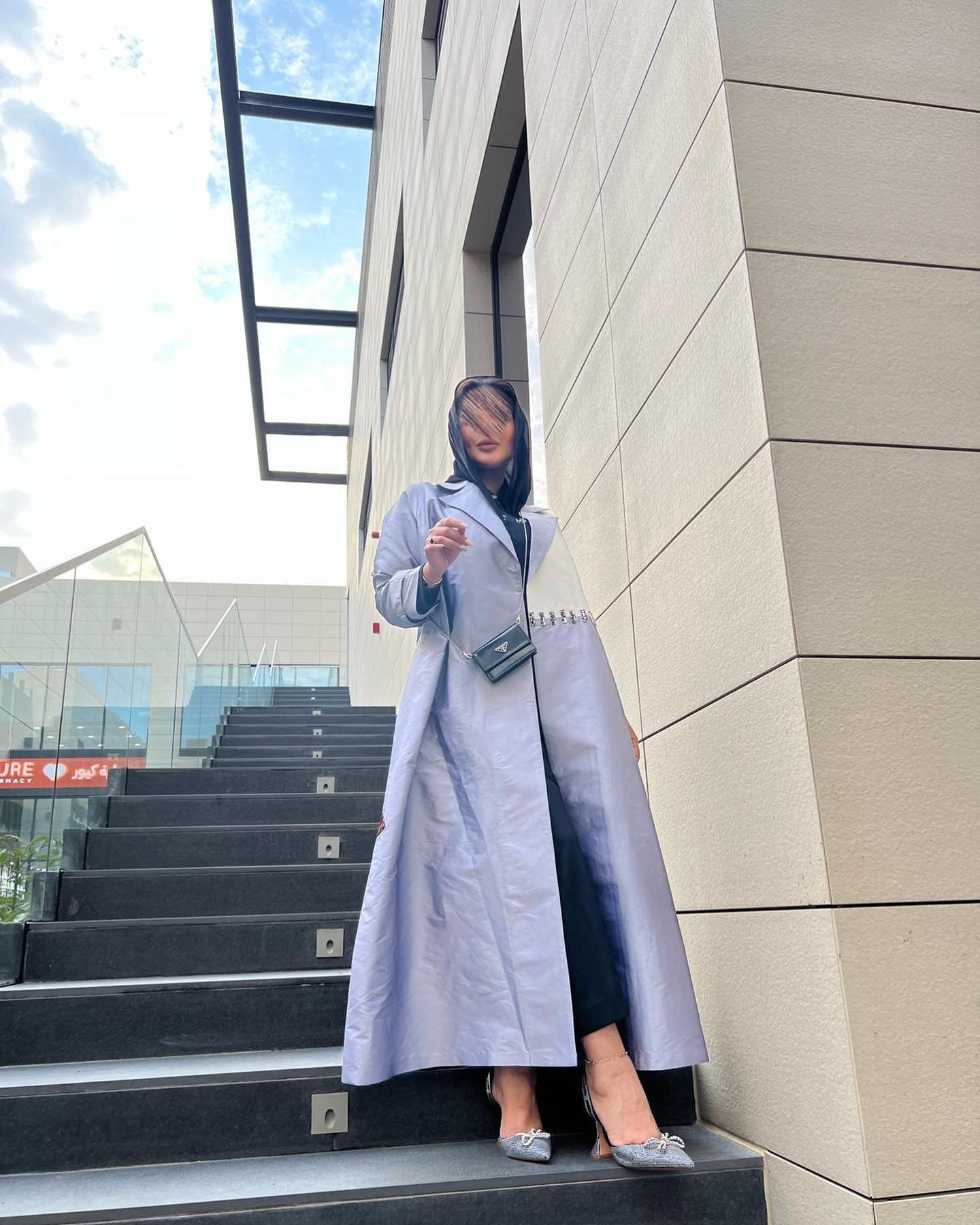 Blue, black and white shiny abaya studded with accessories