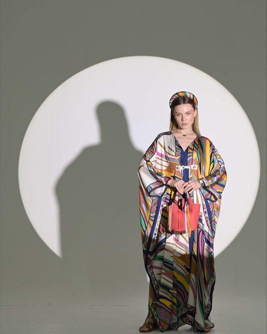 Colorful silky texture abaya with loose stripes, wide sleeves and two buttons in the front