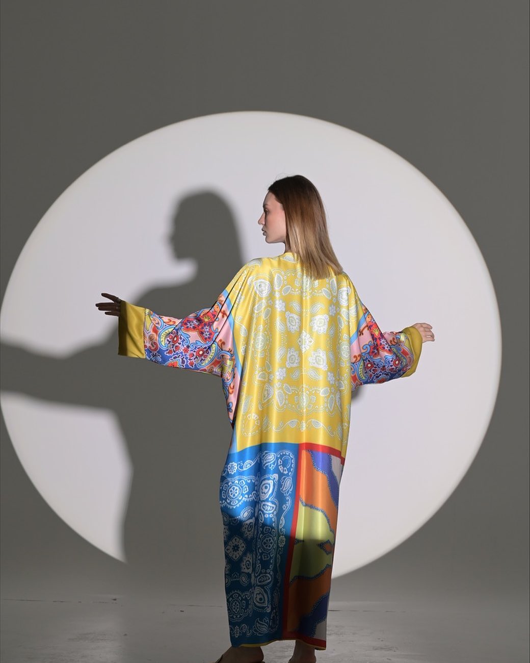 Colorful silky texture abaya with wide sleeves and two leather buttons in the front
