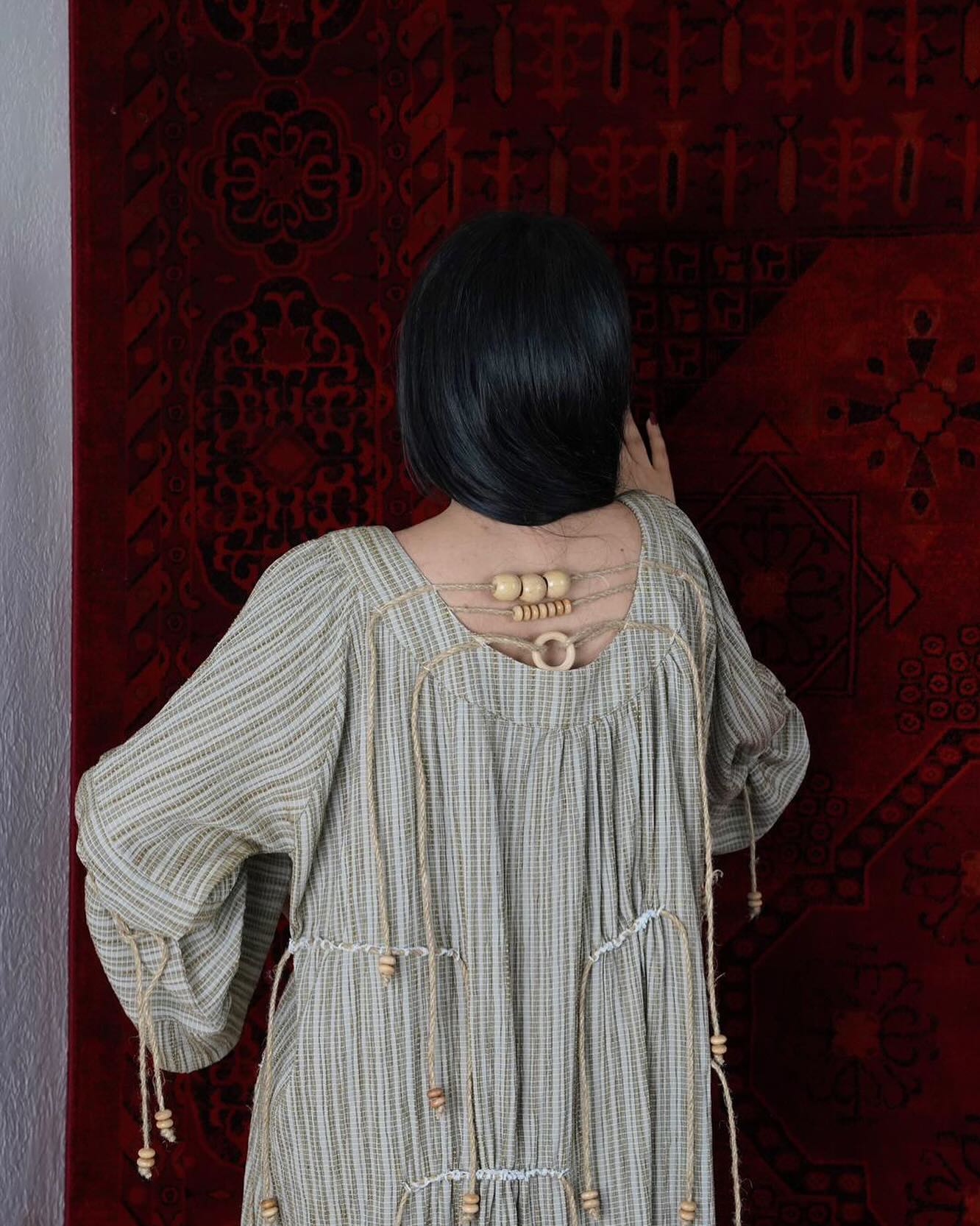 Khaki Dress with rope accessories in the front and back