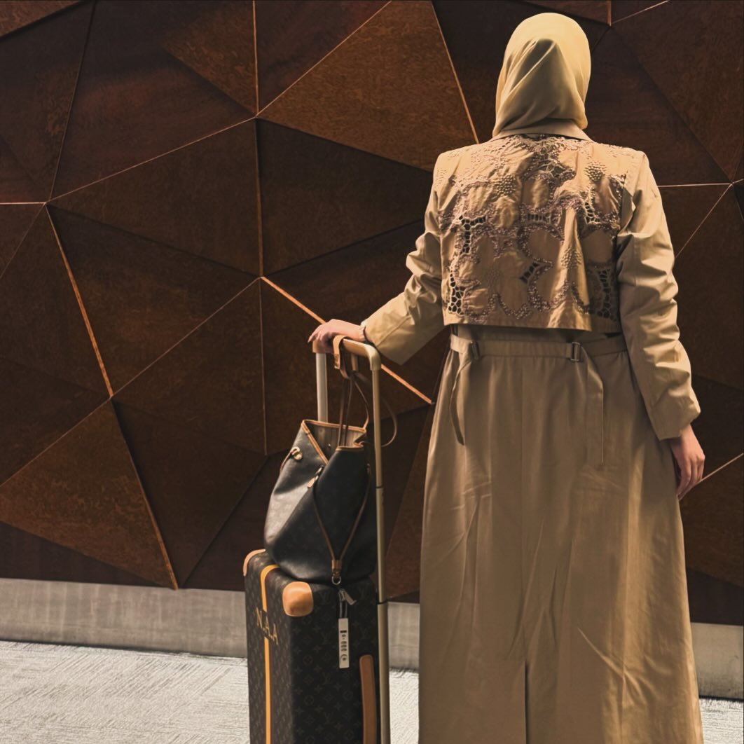 Beige abaya with elegant embroidery on the top