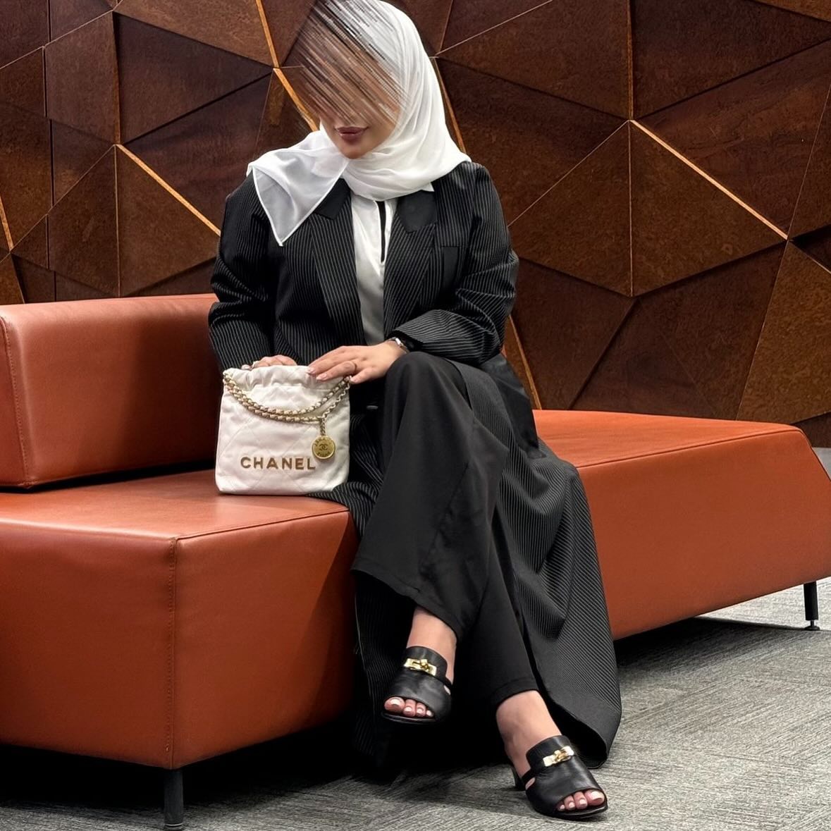 Elegant black abaya with striped pockets