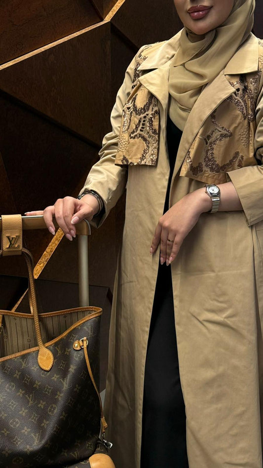 Beige abaya with elegant embroidery on the top