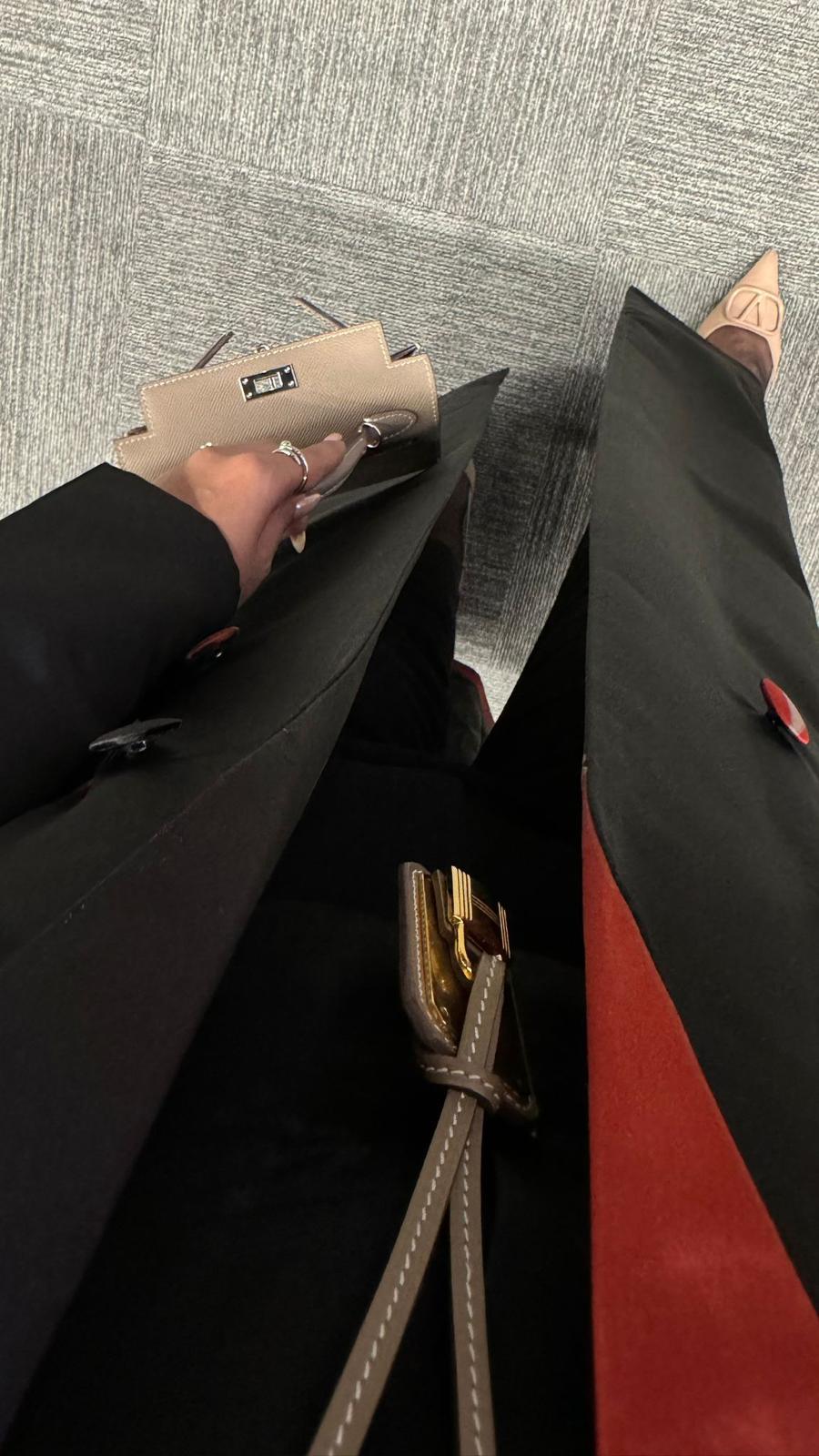 Black abaya with elegant red pieces of fabric
