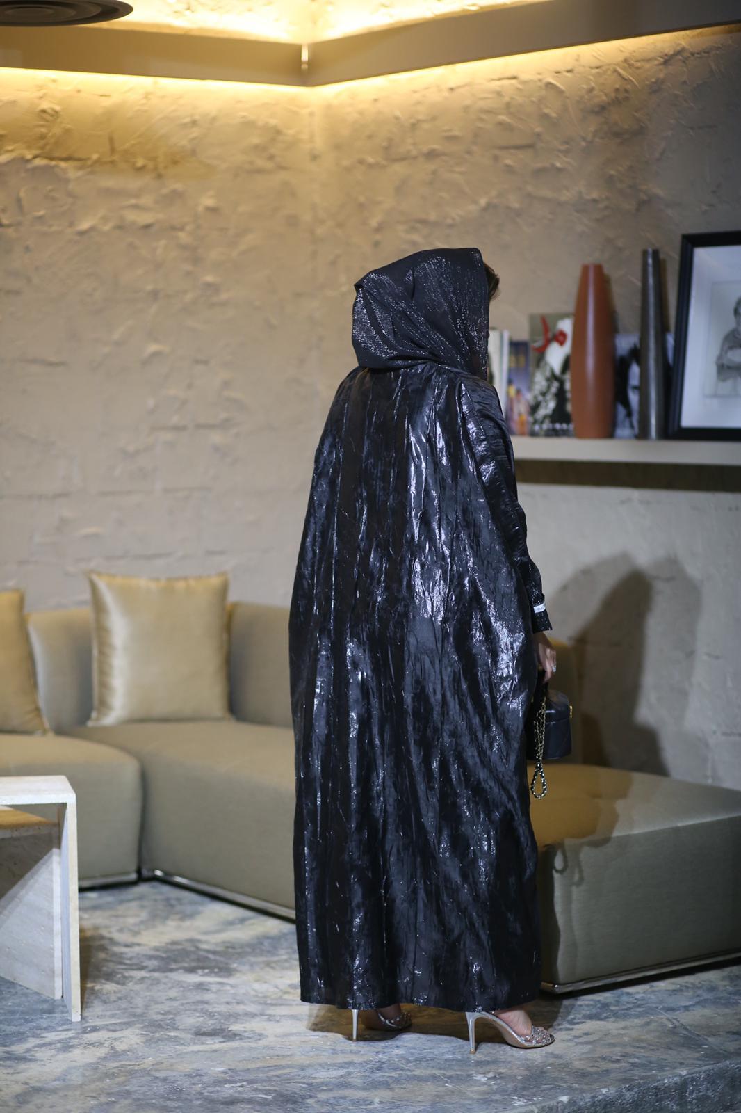 Loose abaya with a leather sheen