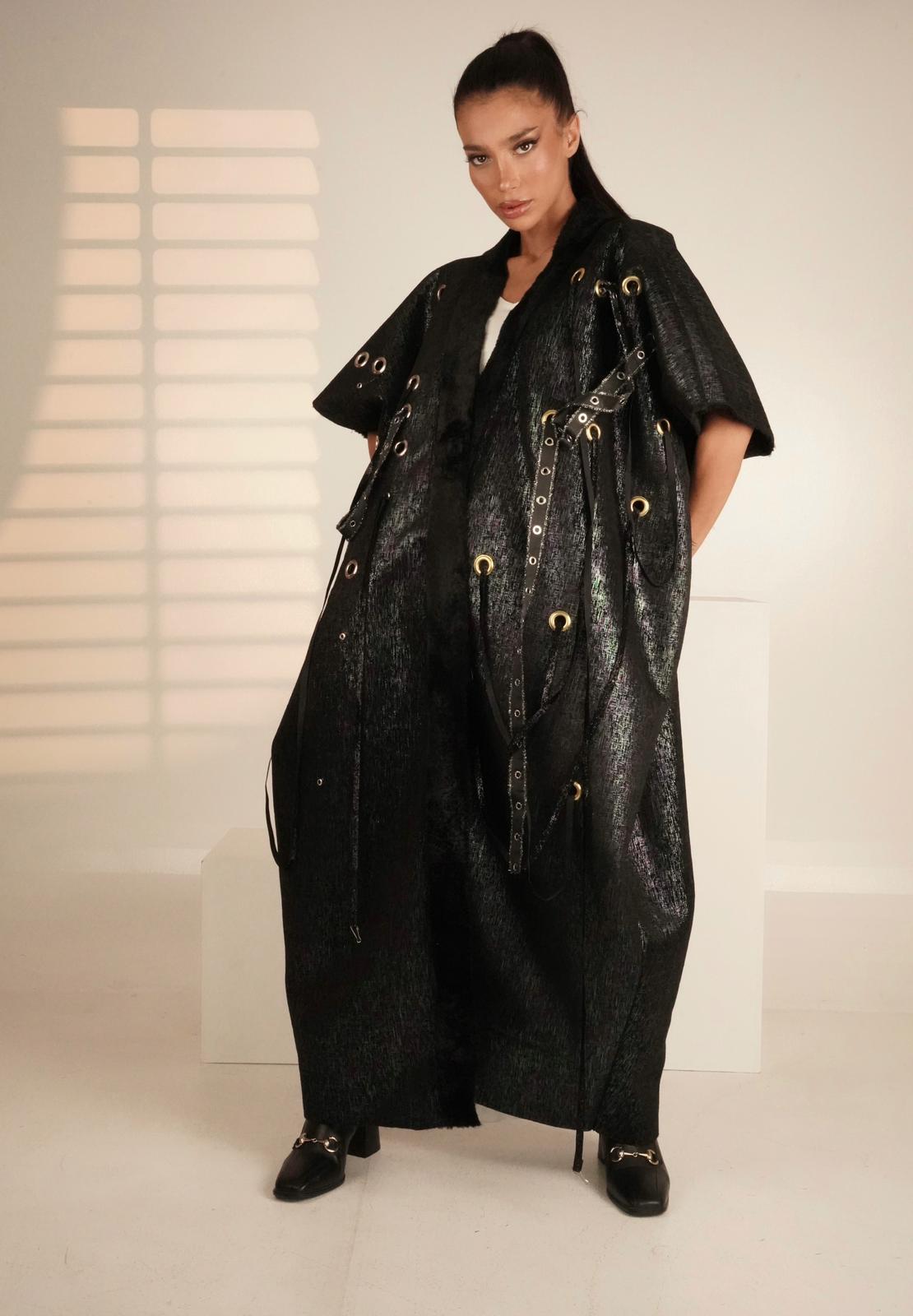 Abaya with metal rings and shiny fabric