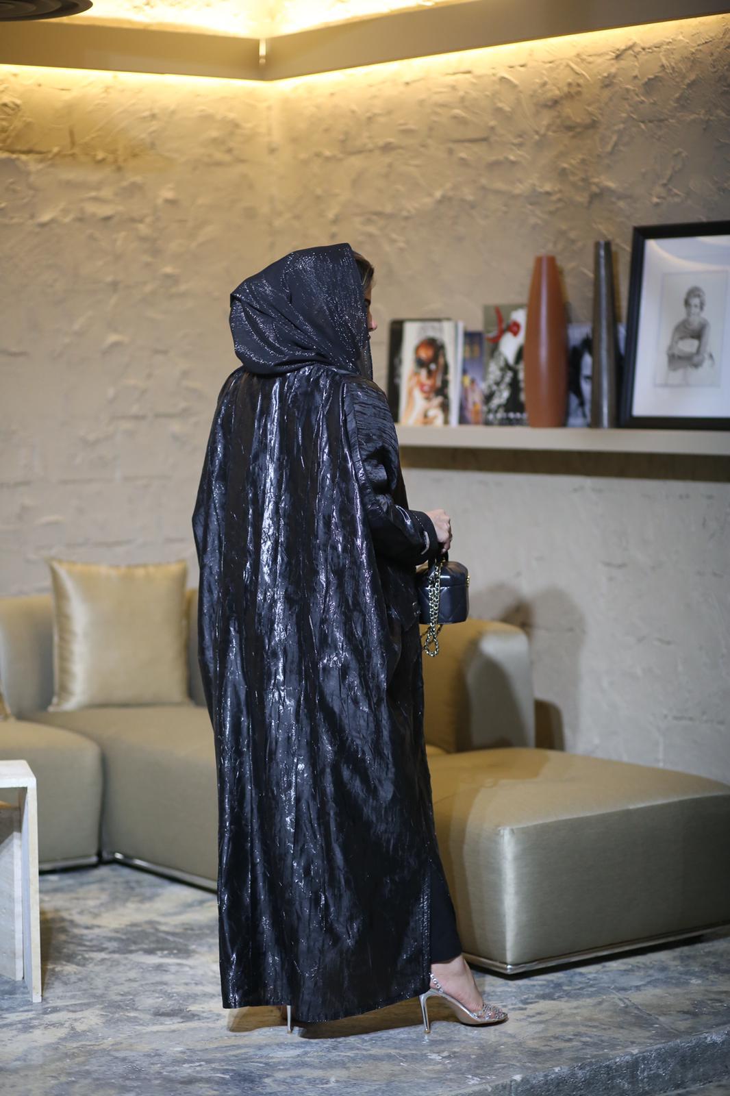 Loose abaya with a leather sheen
